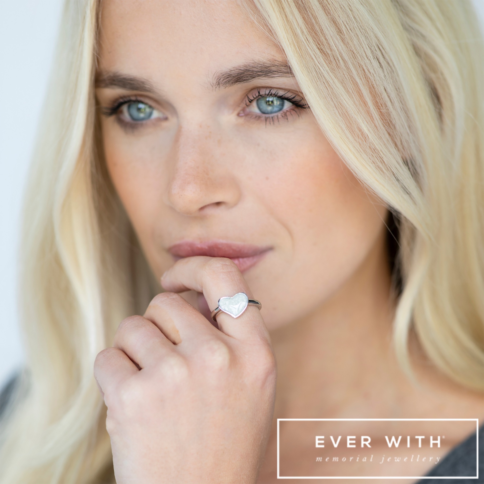 EverWith model wearing a silver heart memorial ring