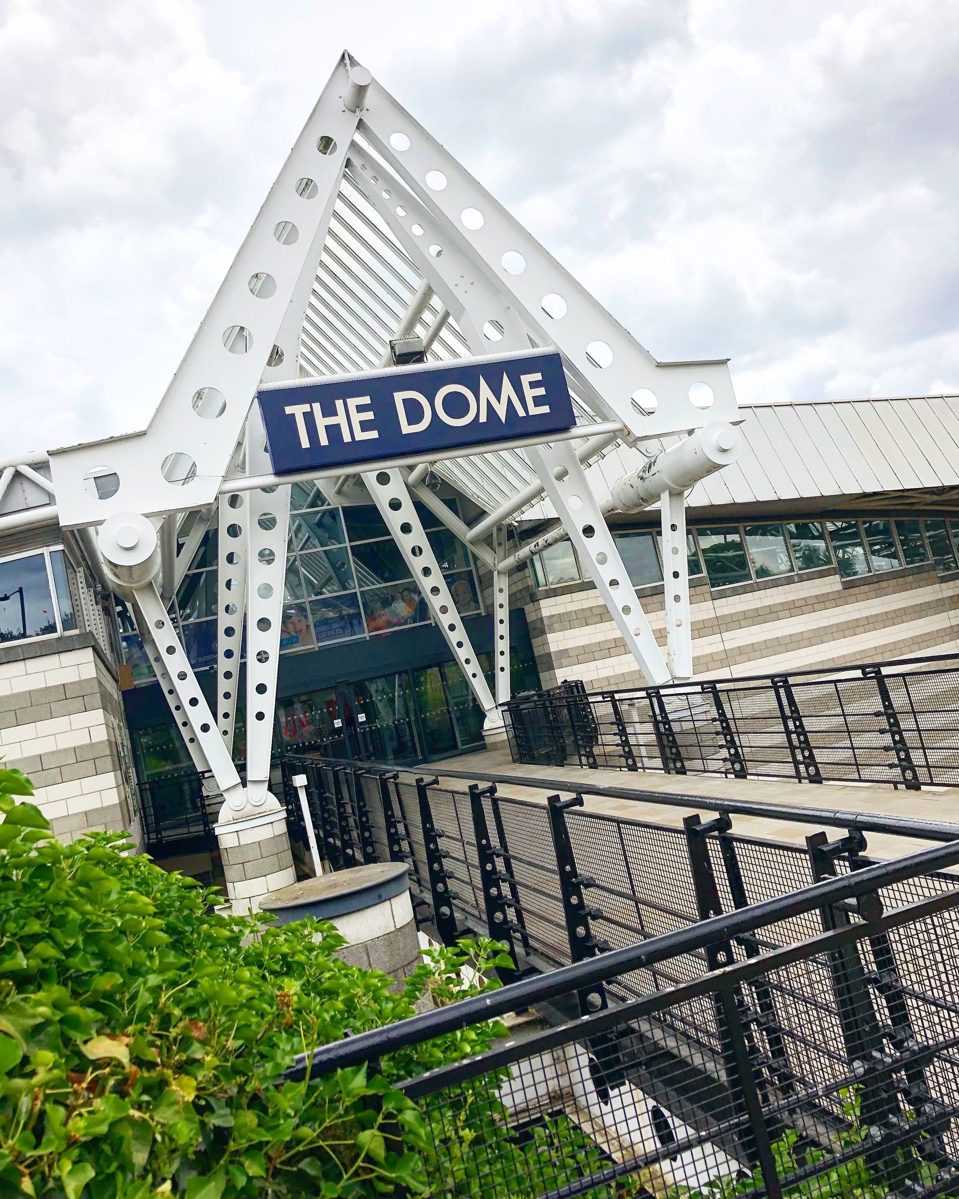 The white steel entrance canopy and sign at Doncaster Dome
